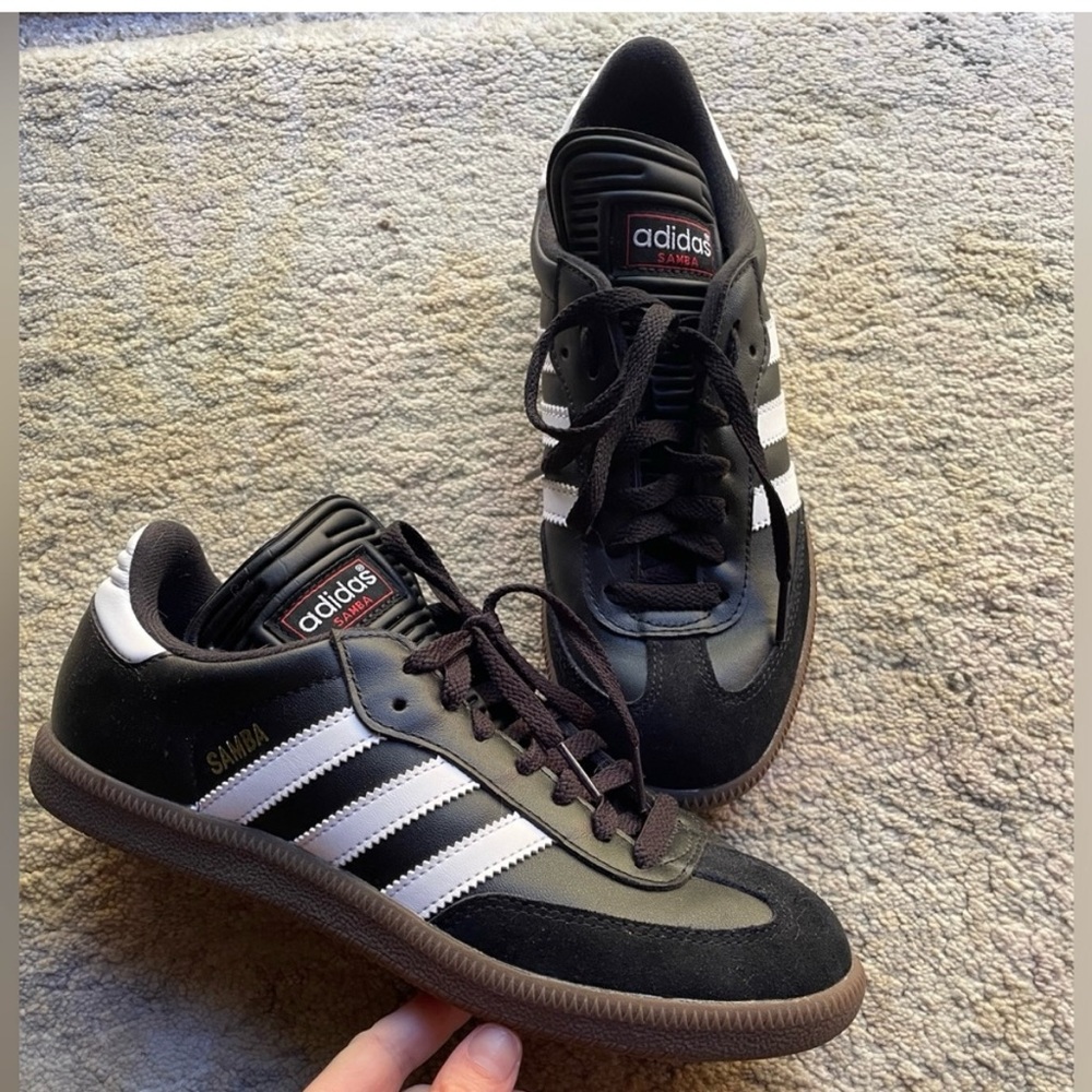 Adidas Black and White Athletic Shoes with Iconic Stripes